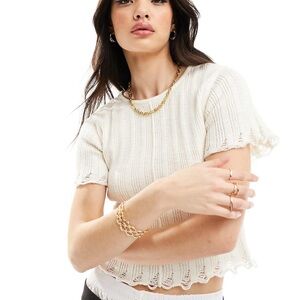 Knitted baby t shirt in cream